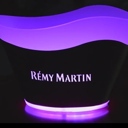 A purple ice bucket with a brand logo 'Remy Martin' on the front, featuring LED lights that change colors.