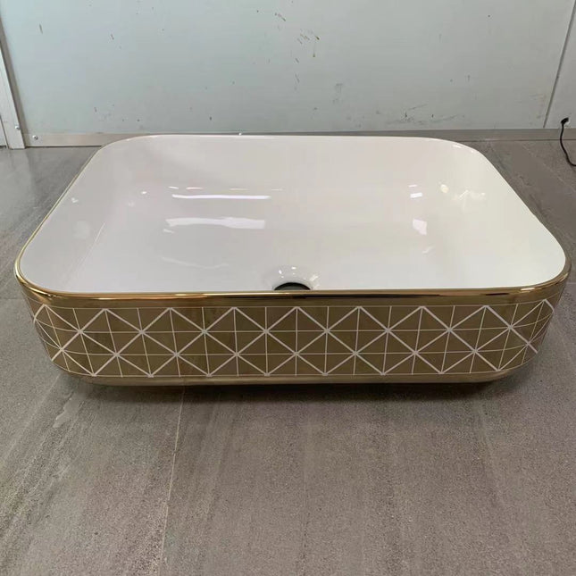 Quadratisches Aufsatzwaschbecken mit aufwendigem geometrischem Goldmuster